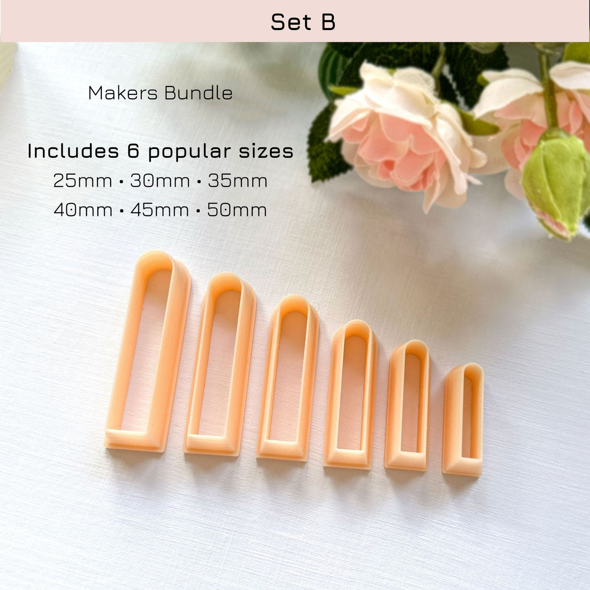 Six peach-colored rectangular cookie clay cutters in ascending sizes arranged on a white surface, with text reading 'Set B' and 'Makers Bundle Includes 6 popular sizes 25mm × 30mm × 35mm 40mm × 45mm × 50mm' and decorative pink flowers in the corner.