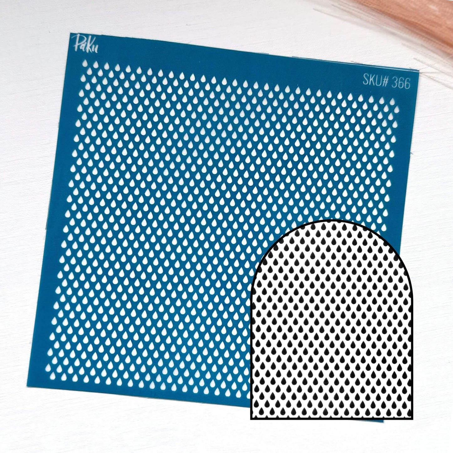 A blue rectangular silkscreen stencil sheet with a repeating teardrop-shaped cutout pattern, shown on a white background with a smaller inset preview of the cutout shape.