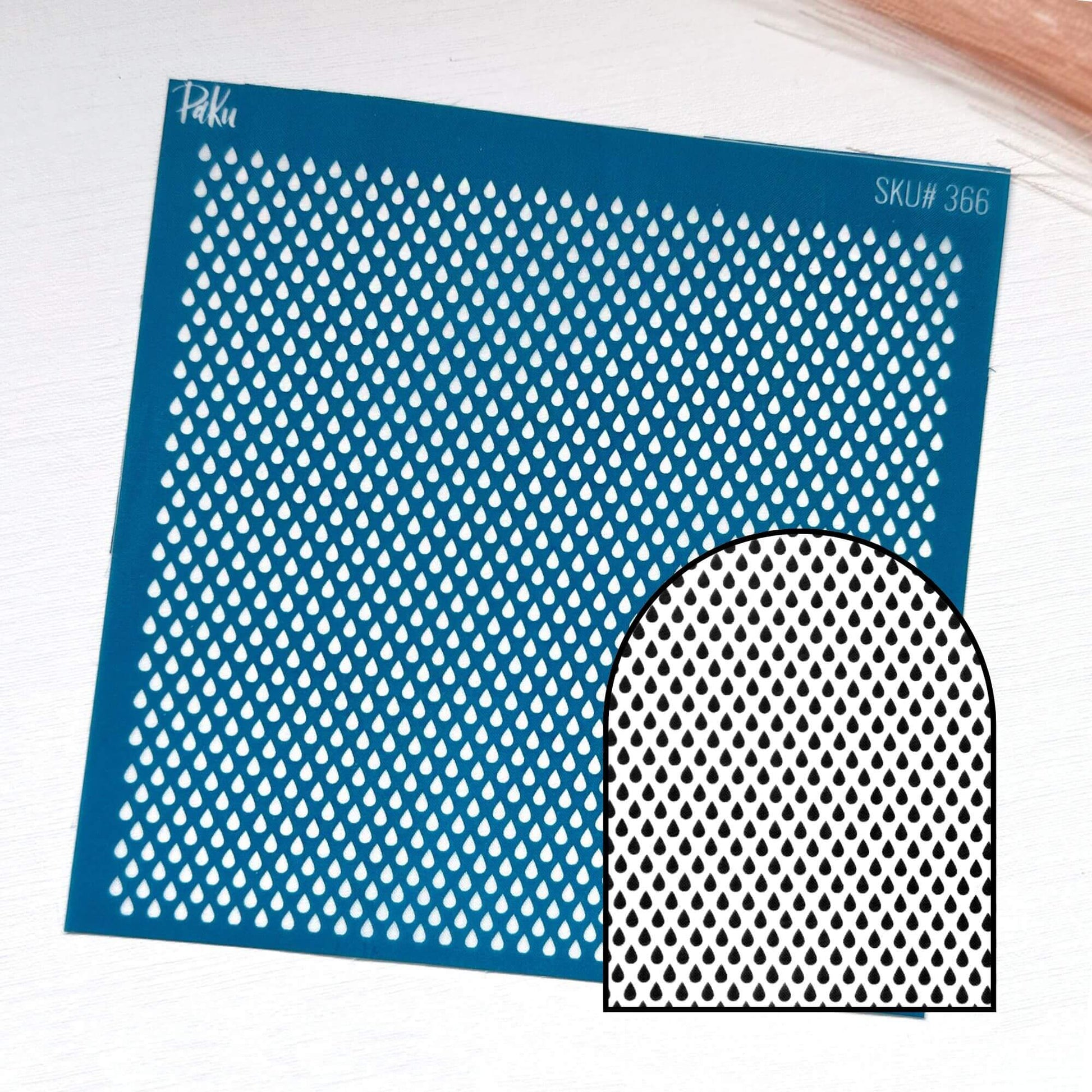 A blue rectangular silkscreen stencil sheet with a repeating teardrop-shaped cutout pattern, shown on a white background with a smaller inset preview of the cutout shape.