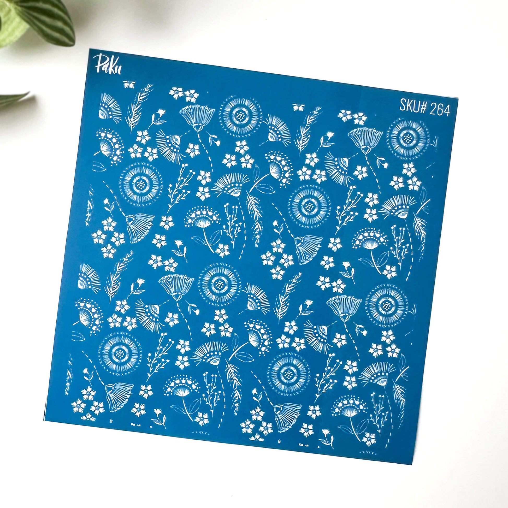 Blue floral silkscreen stencil - boho flowers pattern. Black and white patterned background of the image transfer.
