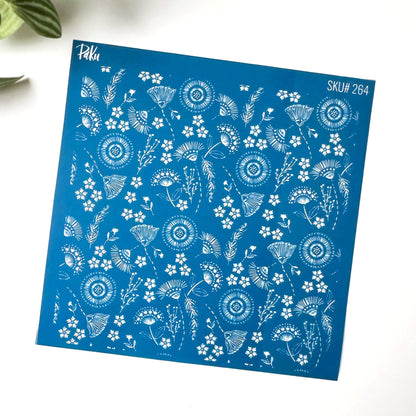 Blue floral silkscreen stencil - boho flowers pattern. Black and white patterned background of the image transfer.