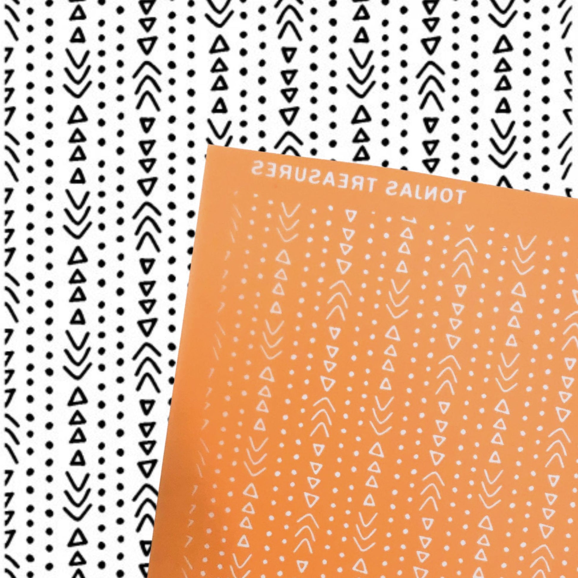 An orange silkscreen 'boho rain' with white geometric patterns and the text 'TONAS TREASURES' is shown diagonally over a black and white patterned background.