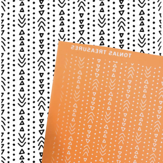 An orange silkscreen 'boho rain' with white geometric patterns and the text 'TONAS TREASURES' is shown diagonally over a black and white patterned background.