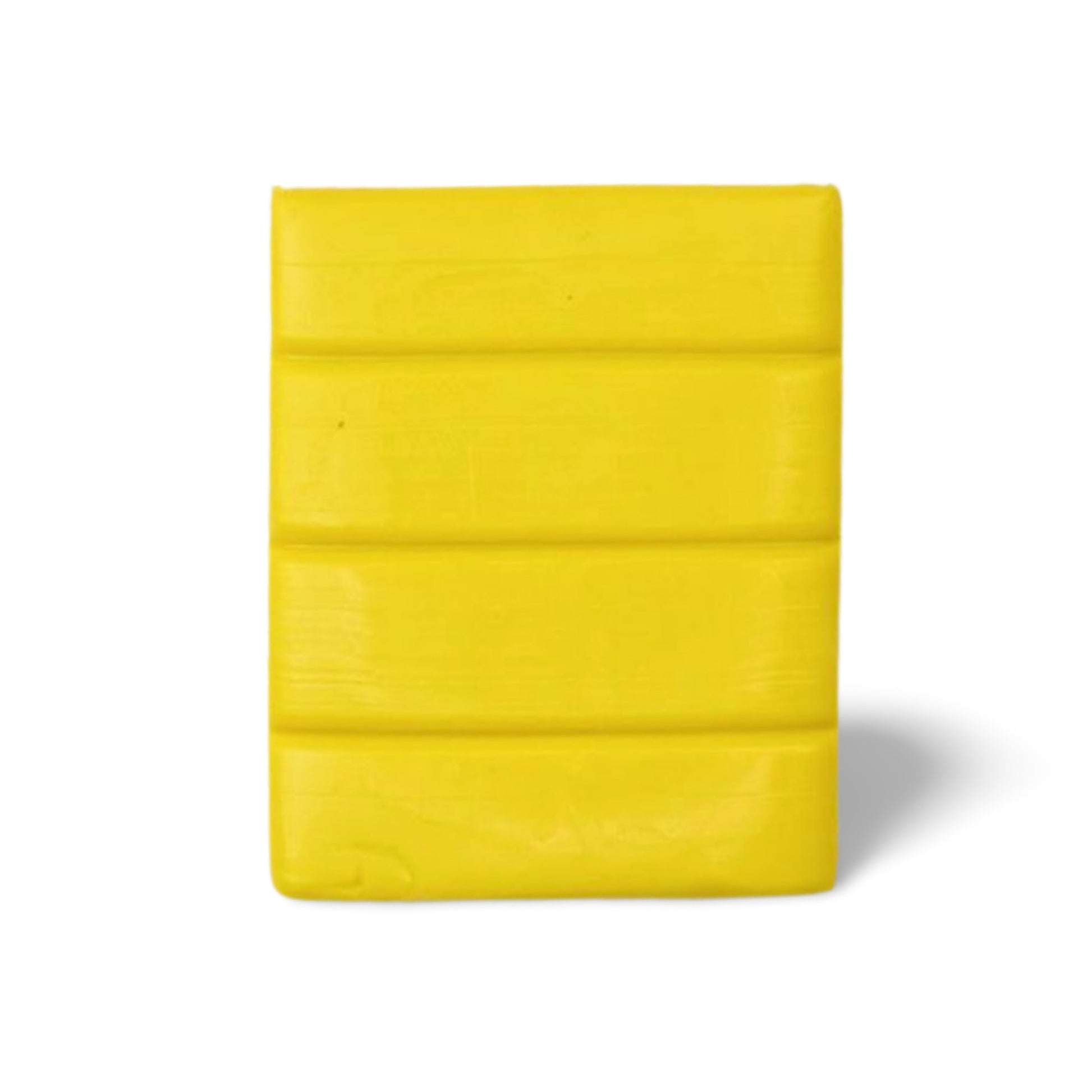 Yellow raw polymer clay on a white background - Sculpey Premo Polymer Clay | zinc yellow - 57g - 