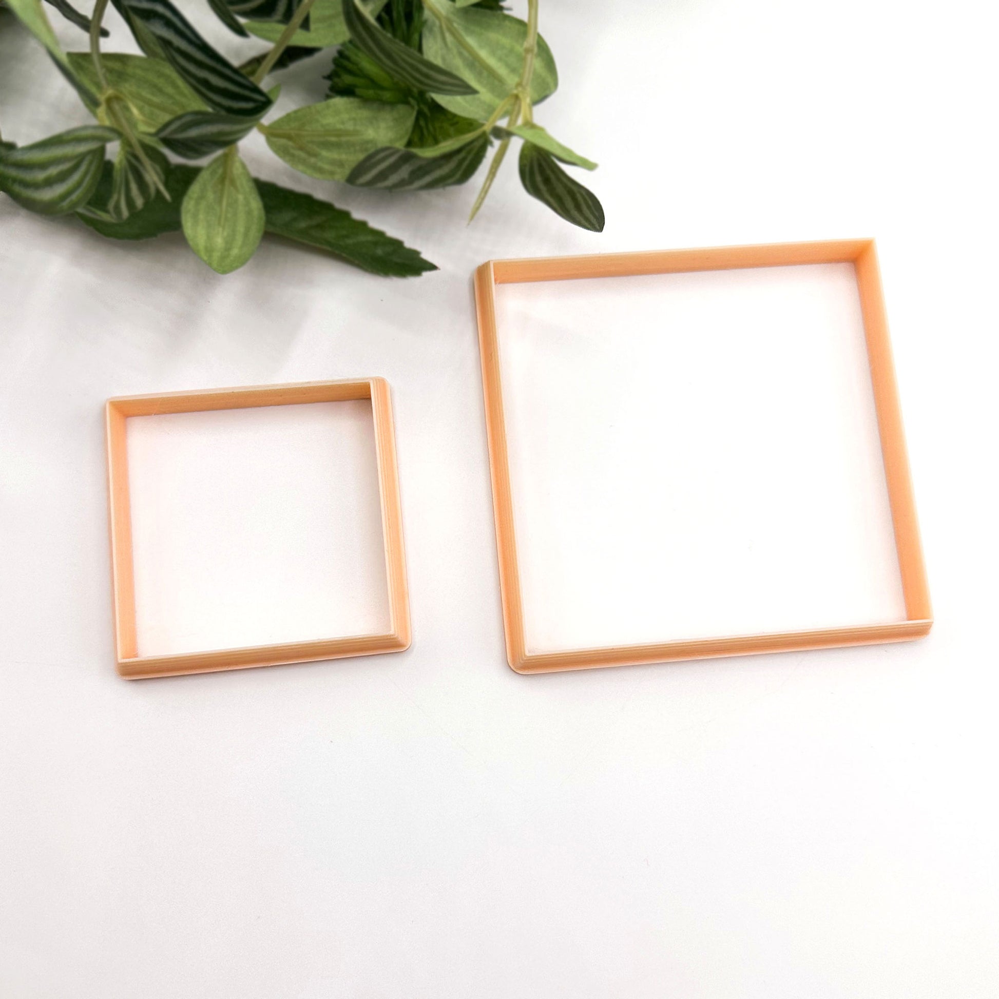 Two large square clay cutters for larger clay crafts like pottery clocks, coasters, trinket plates, jewellery trays etc. The cutters are on a white background