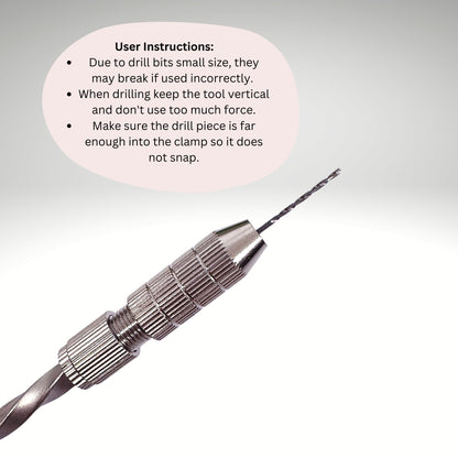 Metal drill bit with user instructions on a gray background