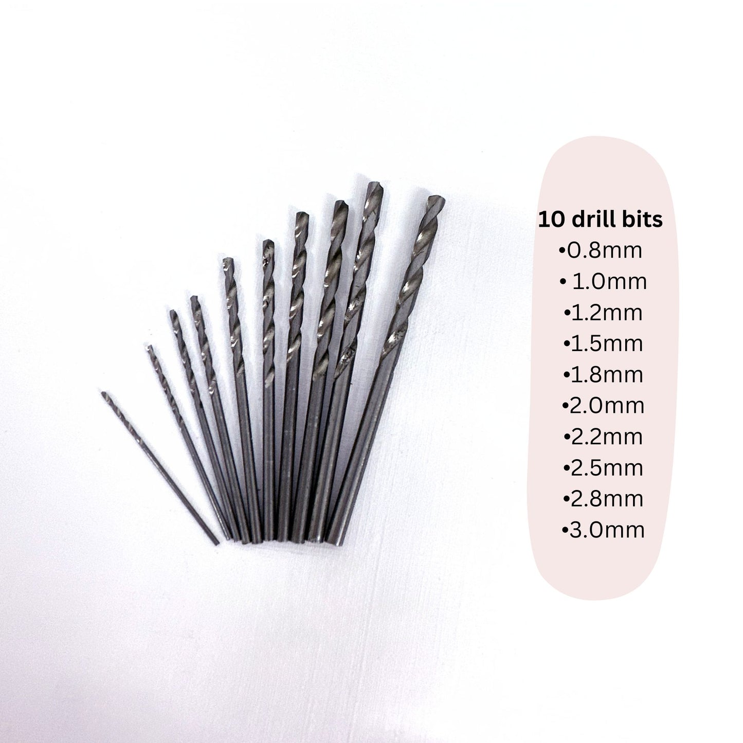 Set of 10 drill bits with size labels on a white background