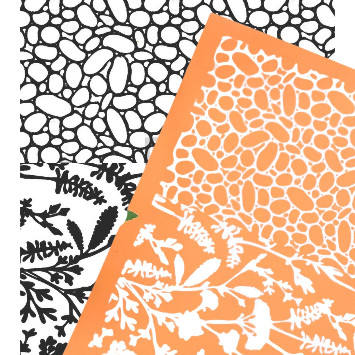 River rock silkscreen stencil. Surface paint screen for polymer clay - picture shows the orange silkscreen with wildflowers and pebbles overlaying a black & white image transfer of the design.