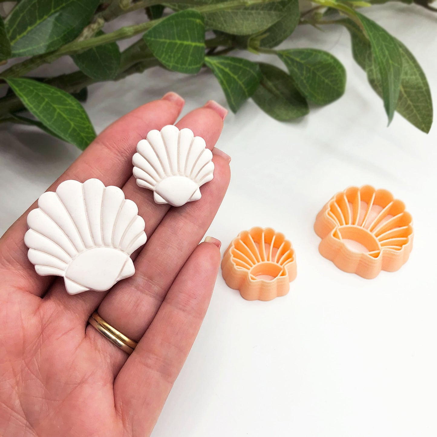 Seashell clay cutter. the 25mm and 35mm shell held in hand in photo, For polymer clay jewellery, earring making.