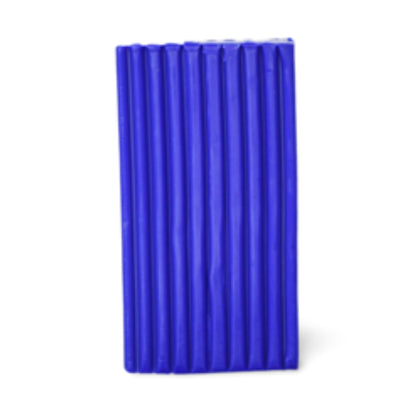A block of ultramarine blue hue clay on a white background.
