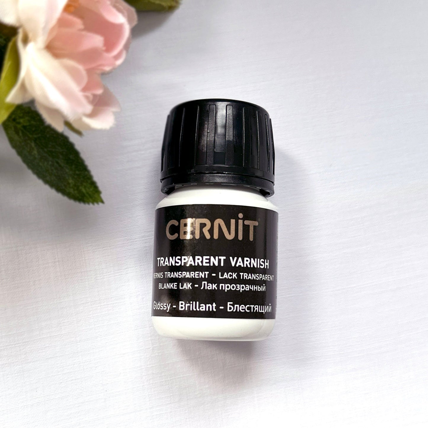 Cernit glossy varnish for polymer clay - 30ml  container with black lid on a white background