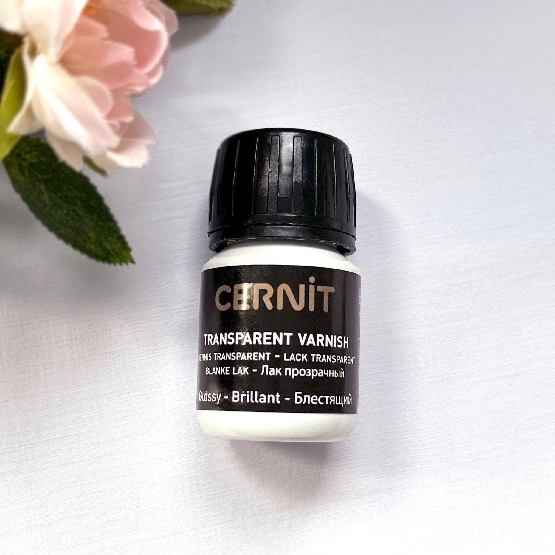 Cernit glossy varnish for polymer clay - 30ml  container with black lid on a white background