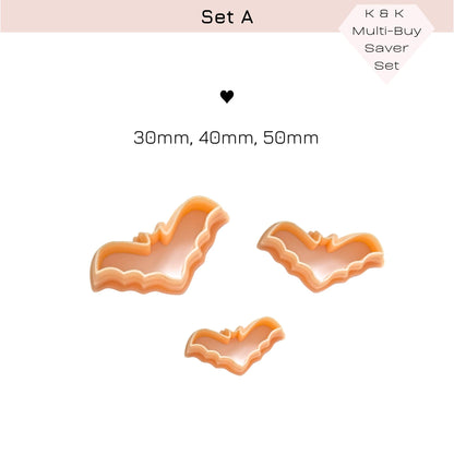 Three bat-shaped cookie cutters in a light peach-orange color, shown on a white background with text indicating sizes 30mm, 40mm, and 50mm, plus a 'K8K Multi-Buy Saver Set' badge.