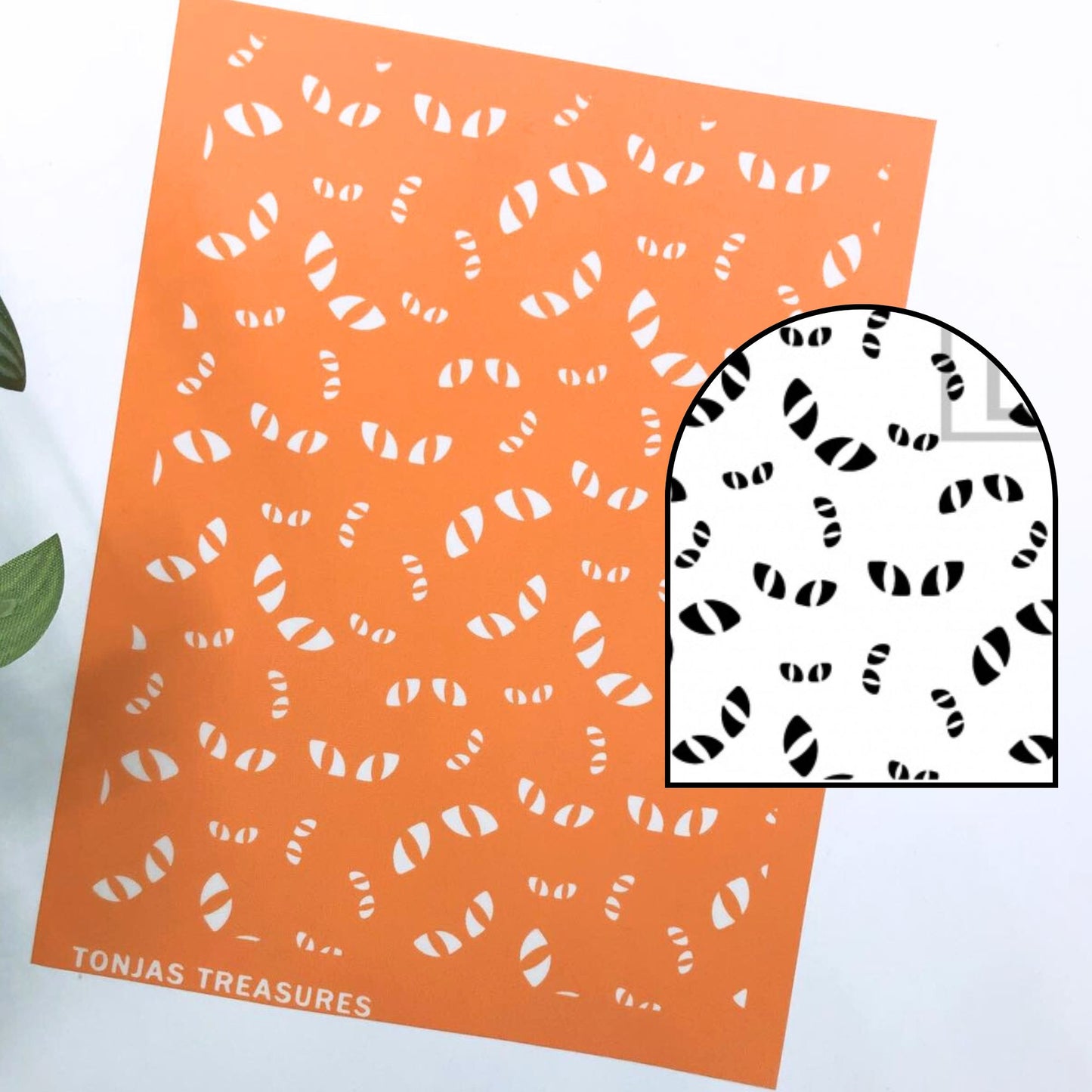 An orange rectangular stencil sheet shown on a white background with a smaller inset showing the black-and-white pattern through the stencil. The brand name 'TONJAS TREASURES' appears at the bottom left.