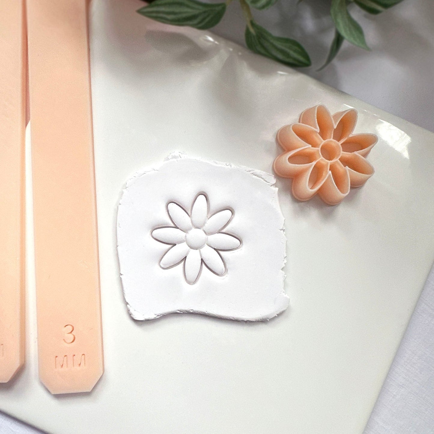 Daisy clay cutter with embossed inner detail. Great for polymer clay earring makers.