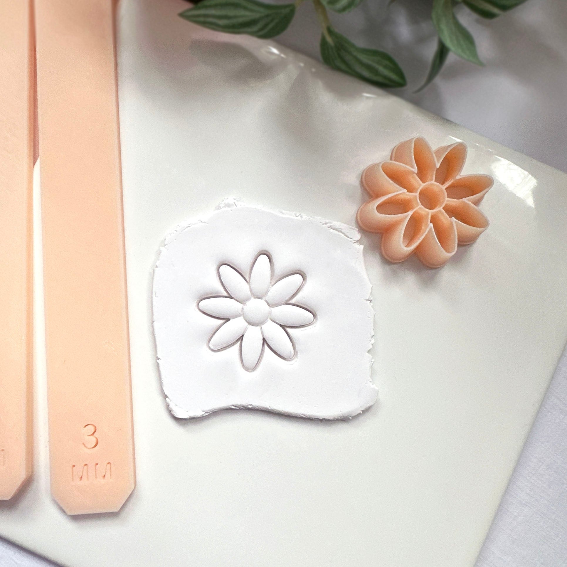 Daisy clay cutter with embossed inner detail. Great for polymer clay earring makers.
