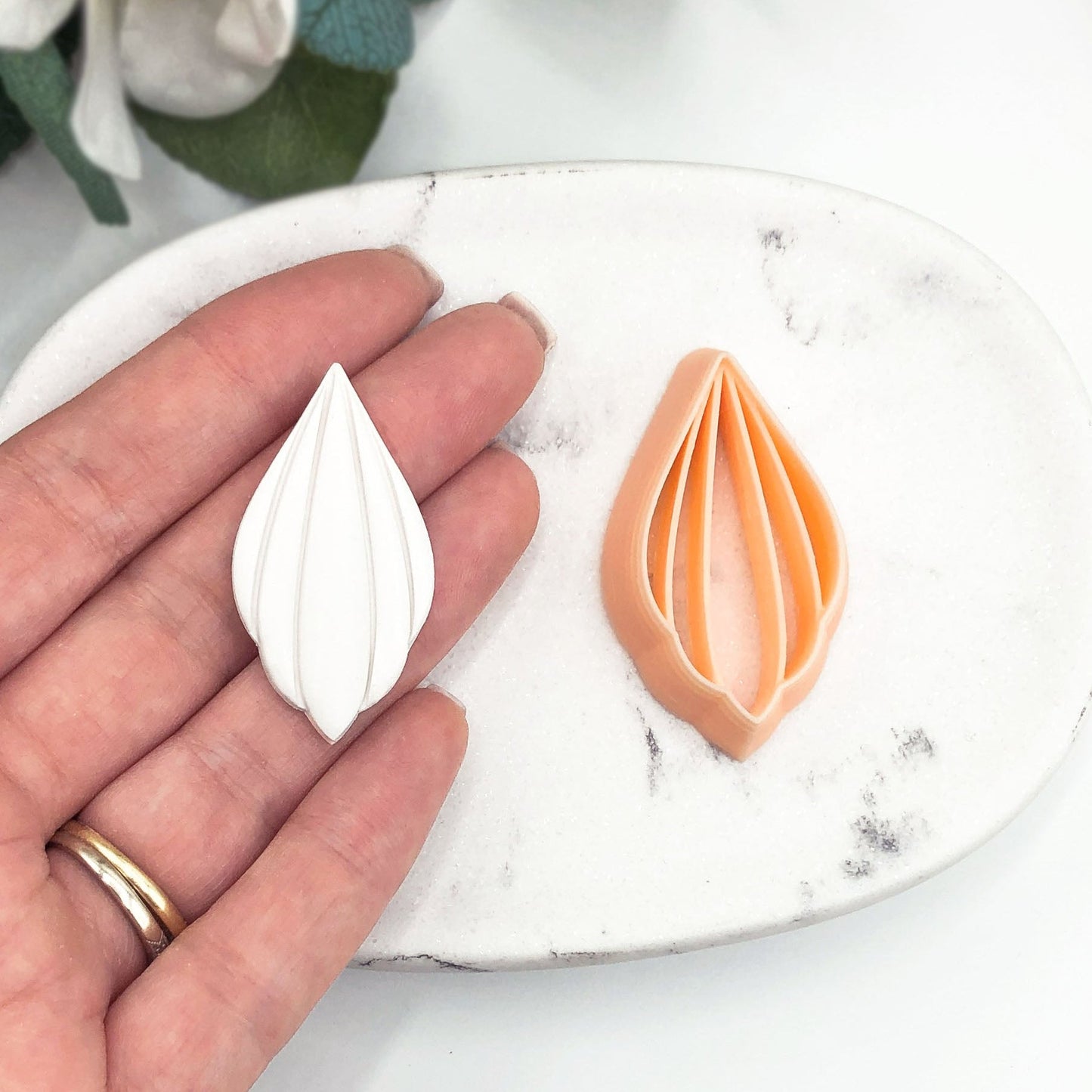 Petal drop clay cutter with viens stamp for polymer clay jewellery making.