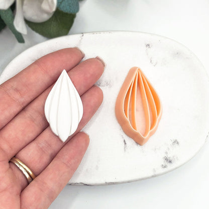 Petal drop clay cutter with viens stamp for polymer clay jewellery making.