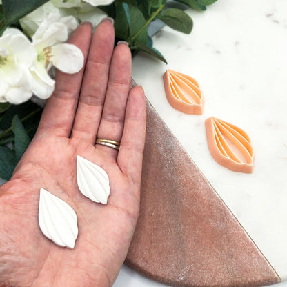 Petal drop clay cutter with viens stamp for polymer clay jewellery making.