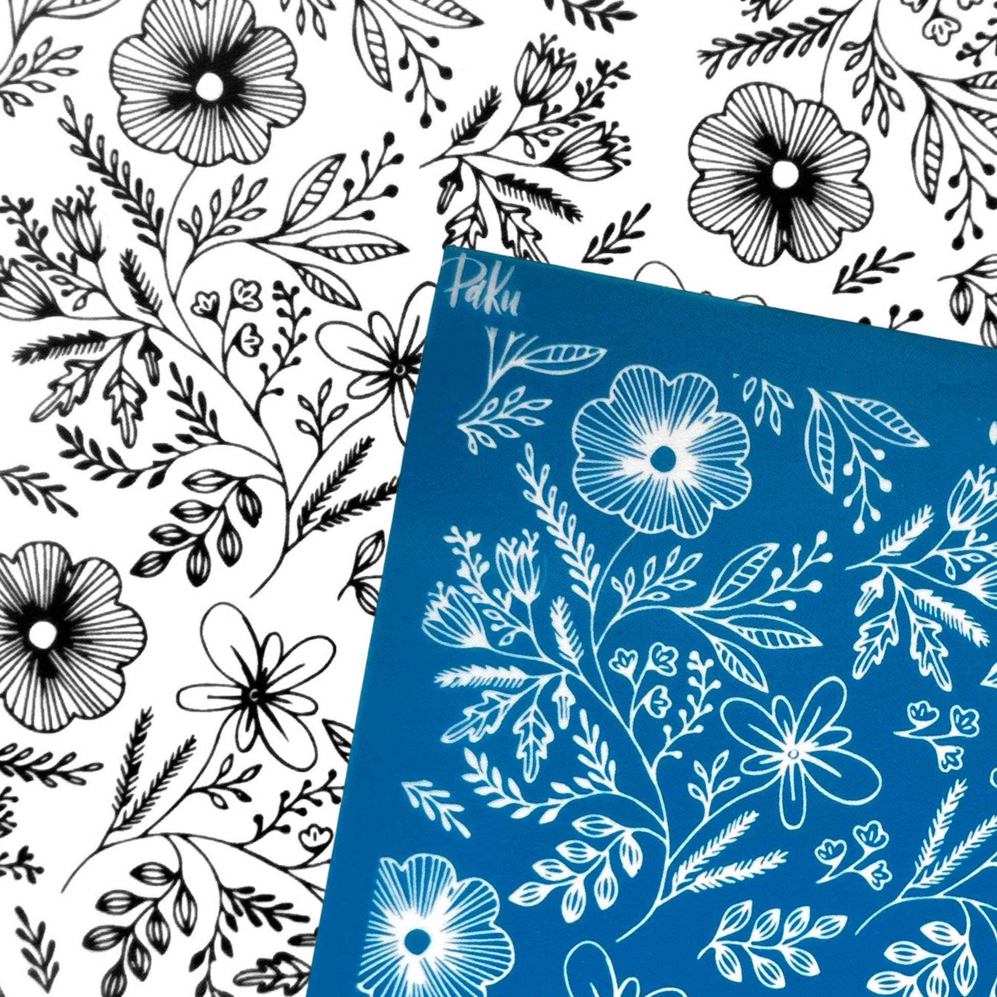 A blue rectangular silkscreen stencil with a white floral line-art pattern, placed diagonally over a white background covered in the same black floral line-art pattern.