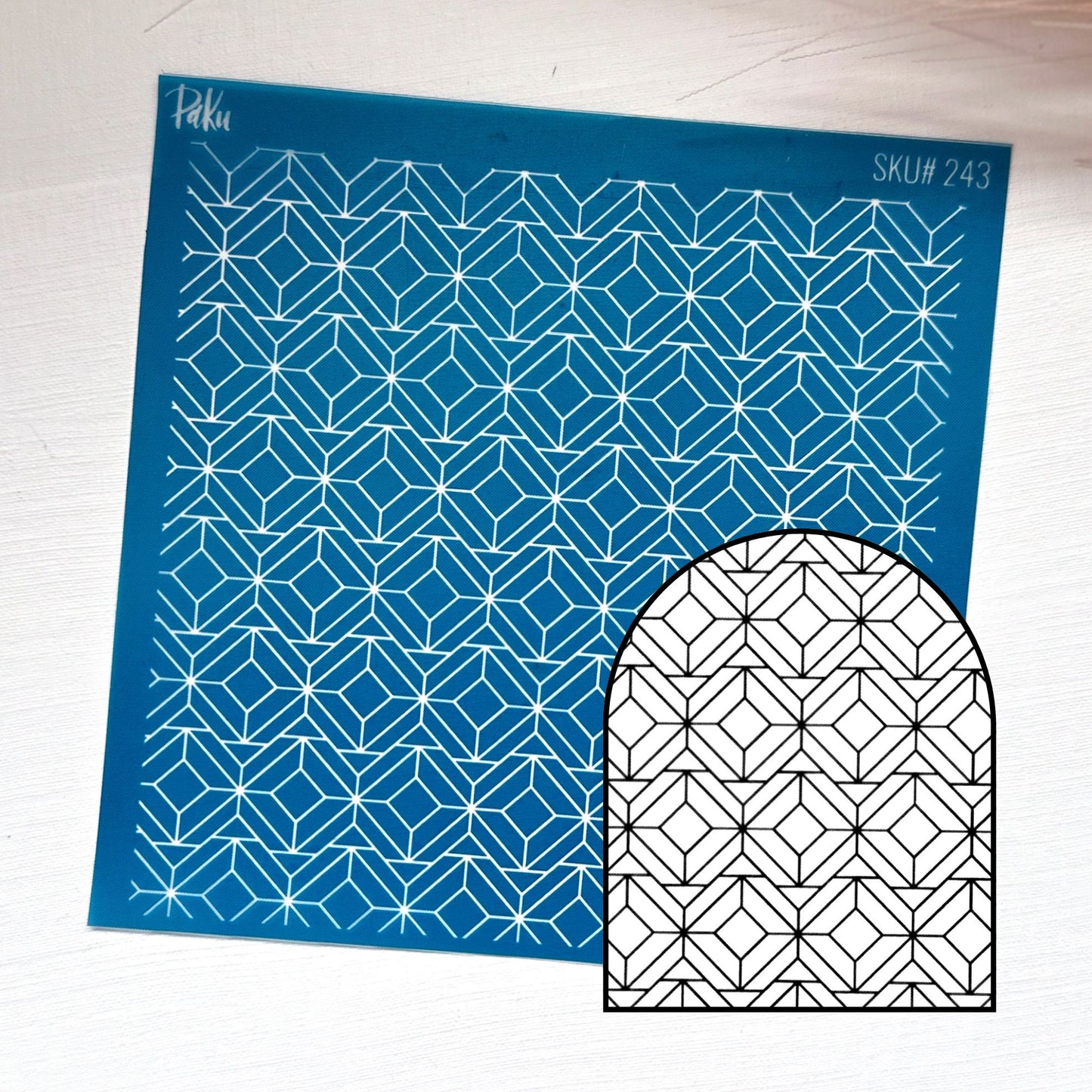 blue geometric patterned silkscreen stencil with the black and white example of image transfer, for polymer clay and cake making