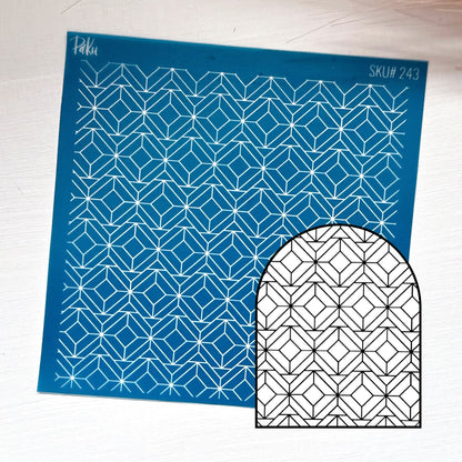 blue geometric patterned silkscreen stencil with the black and white example of image transfer, for polymer clay and cake making