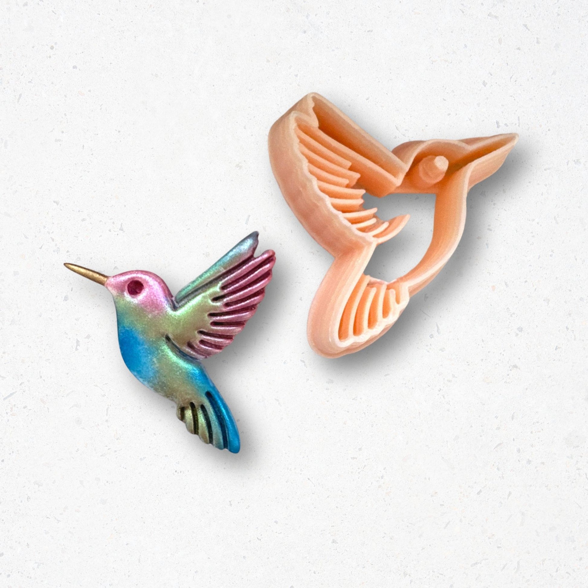 Hummingbird clay cutter with the colourful polymer clay cut out 