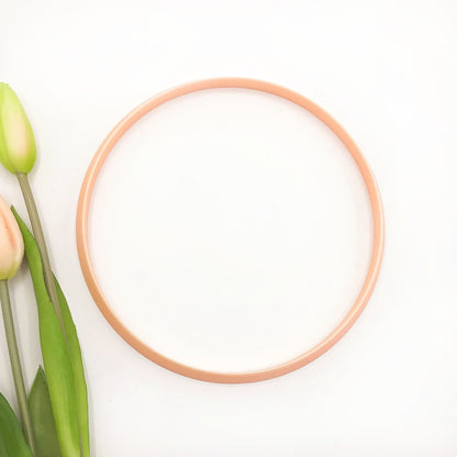 Large circle clay cutter for pottery, polymer and airdry clay. The circle is on a white background with flowers