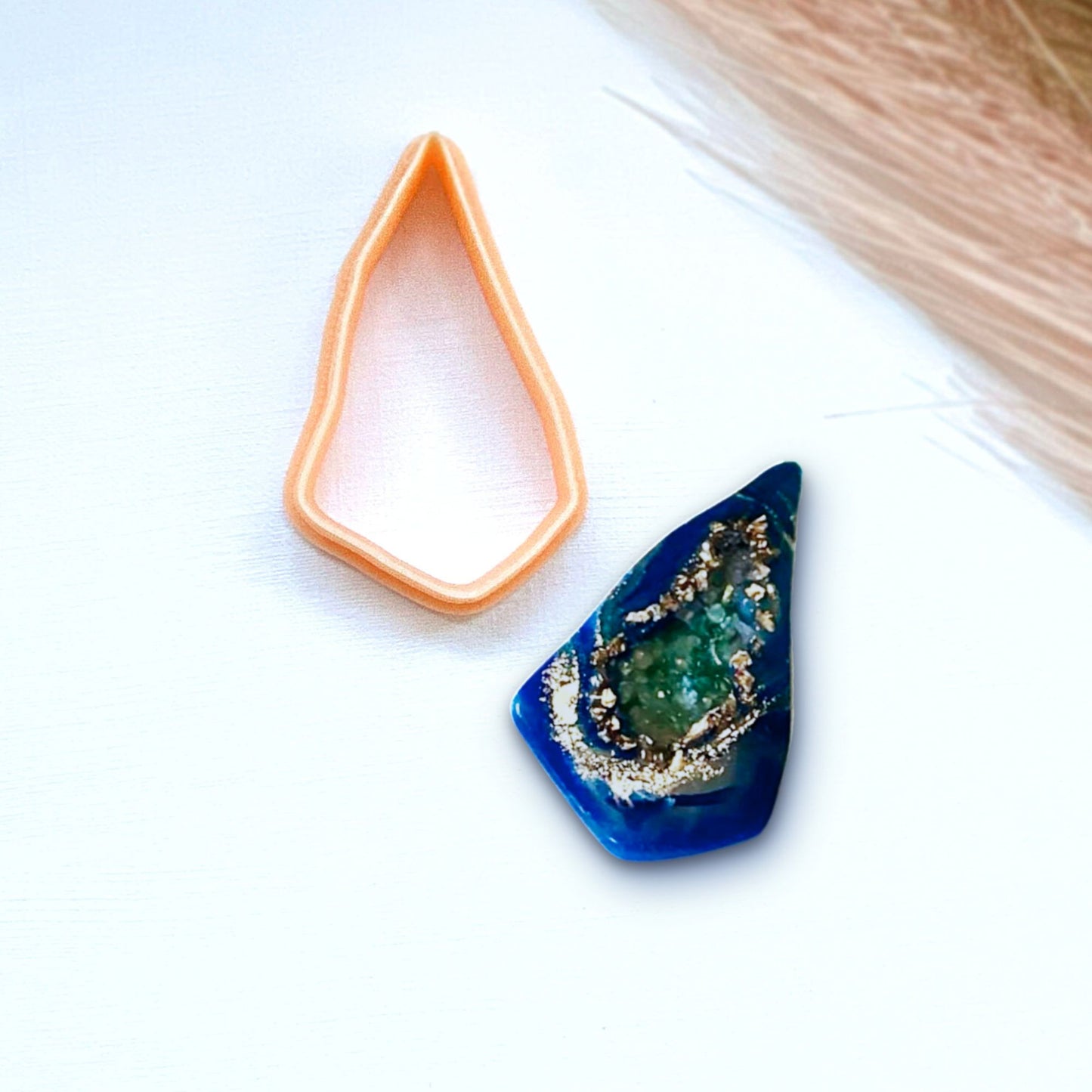 Organic drop, abstarct dagger shape clay cutter and a polymer clay made sample