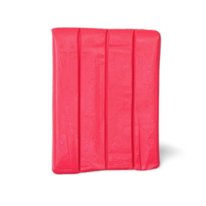 Pink blush raw unpackaged polymer clay on a white background
