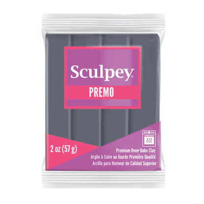 Sculpey Premo clay old package with purple and pink design on a white background
