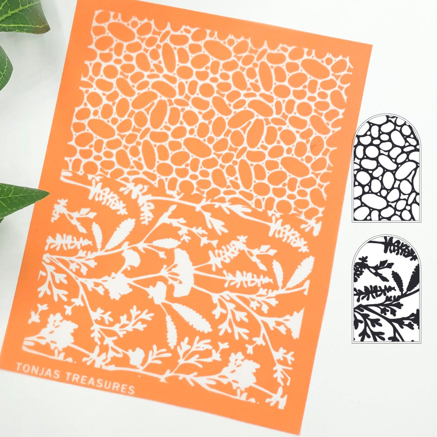 River rock silkscreen stencil. Surface paint screen for polymer clay - picture shows the orange silkscreen with wildflowers and pebbles and a black & white image transfer of the design.