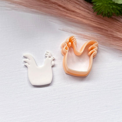 Rooster clay cutter for polymer clay crafts and jewellery making. This rooster is made using the 35mm clay cutter, it is white polymer clay 