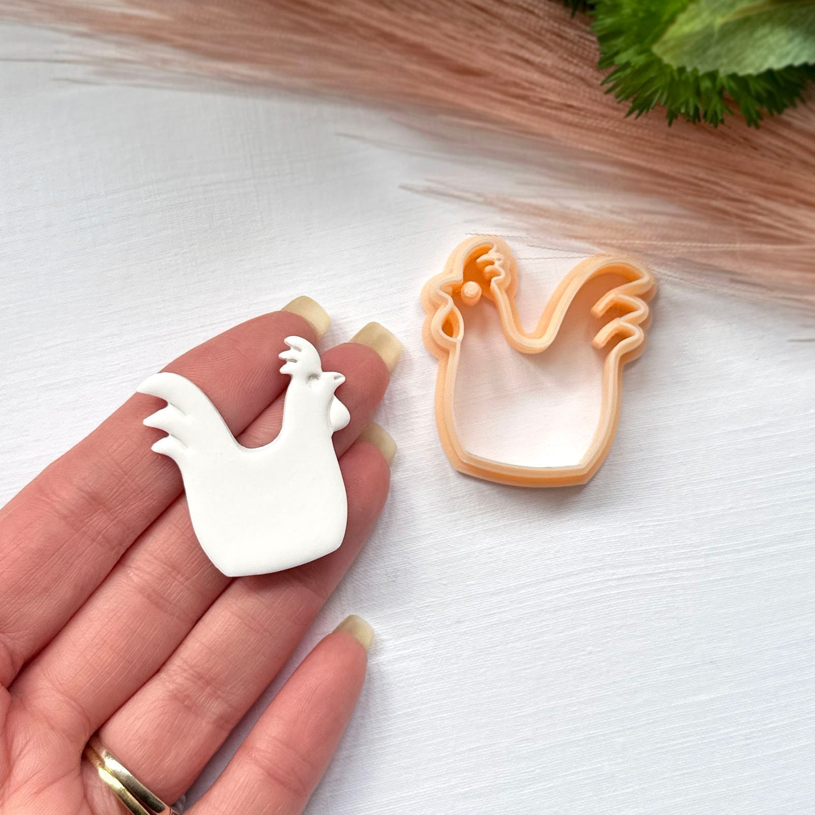 Rooster clay cutter for crafts and jewellery making. This rooster is made using the 35mm clay cutter, it is white polymer clay