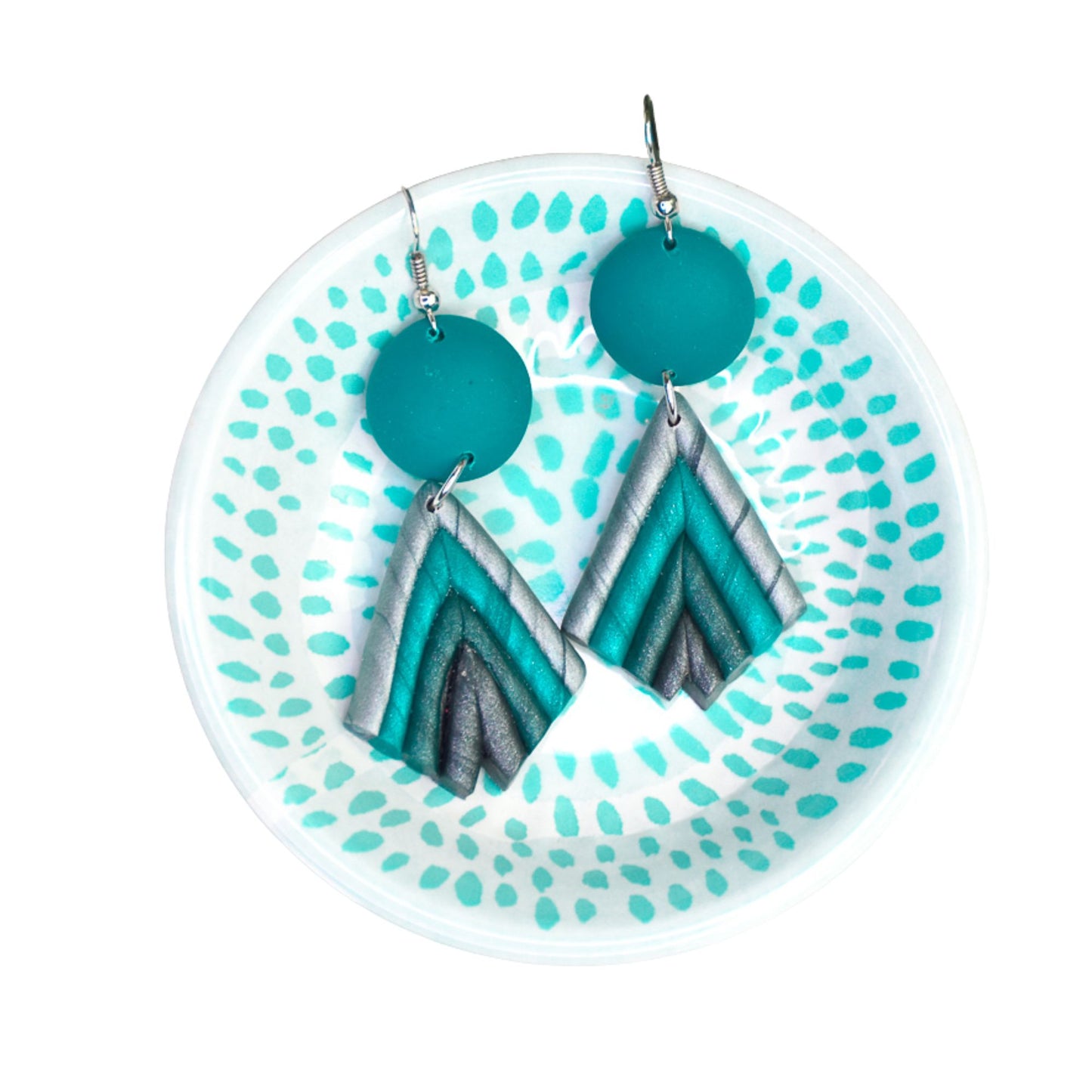 Teal and silver earrings on a decorative plate with a white background - made with Sculpey Premo Polymer Clay | Teal - 57g - 